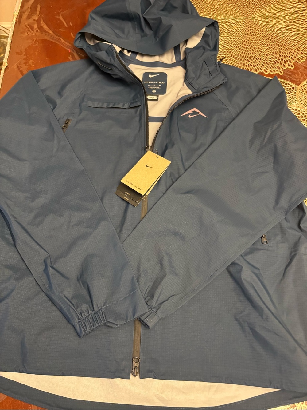 Nike women’s Navy Hooded Rain Jacket with Subtle Pink Logo